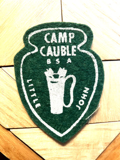 Camp Cauble Little John emblem silkscreened on felt on canvas