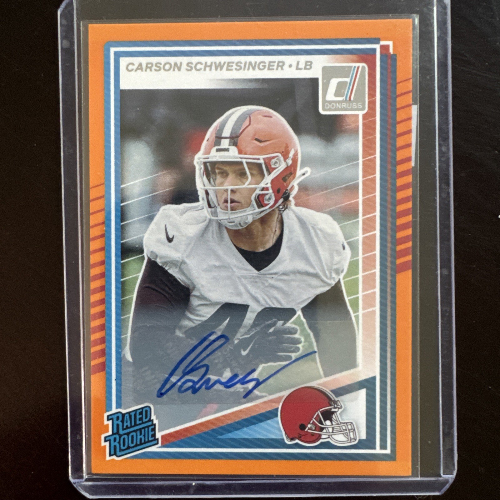 2025 Donruss Carson Schwesinger Rated Rookie #392 Orange RC Autograph Football