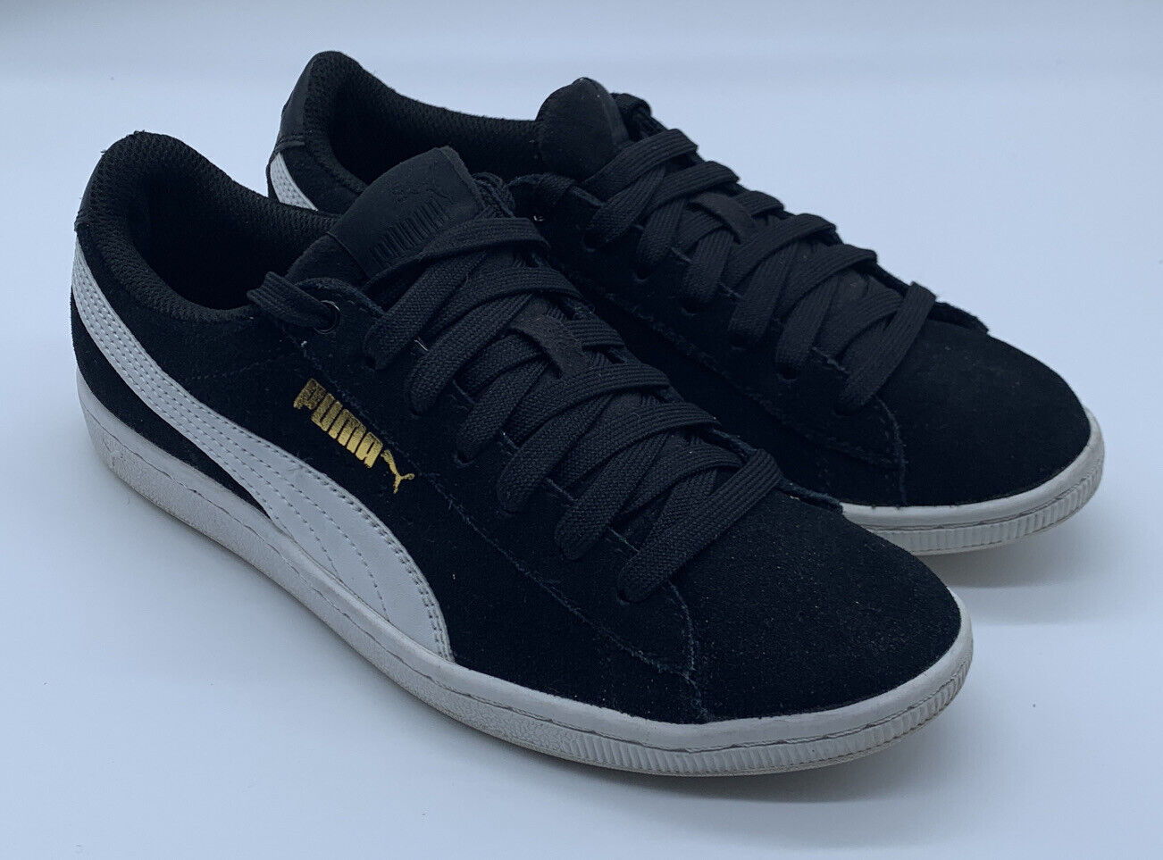 Puma black suede sneakers with white stripe Size 7