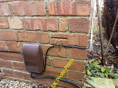 Photo 6x4 OS benchmark - Knowle, 93 Hampton Road Copt Heath An OS cutmark c2015