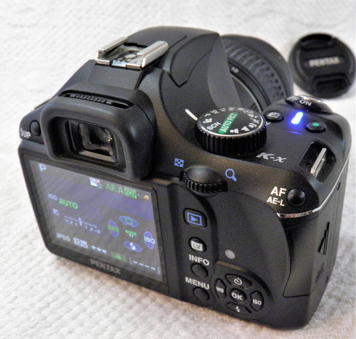 Pentax K-x Digital SLR with 2.7-inch LCD and 18-55mm f/3.5-5.6 AL