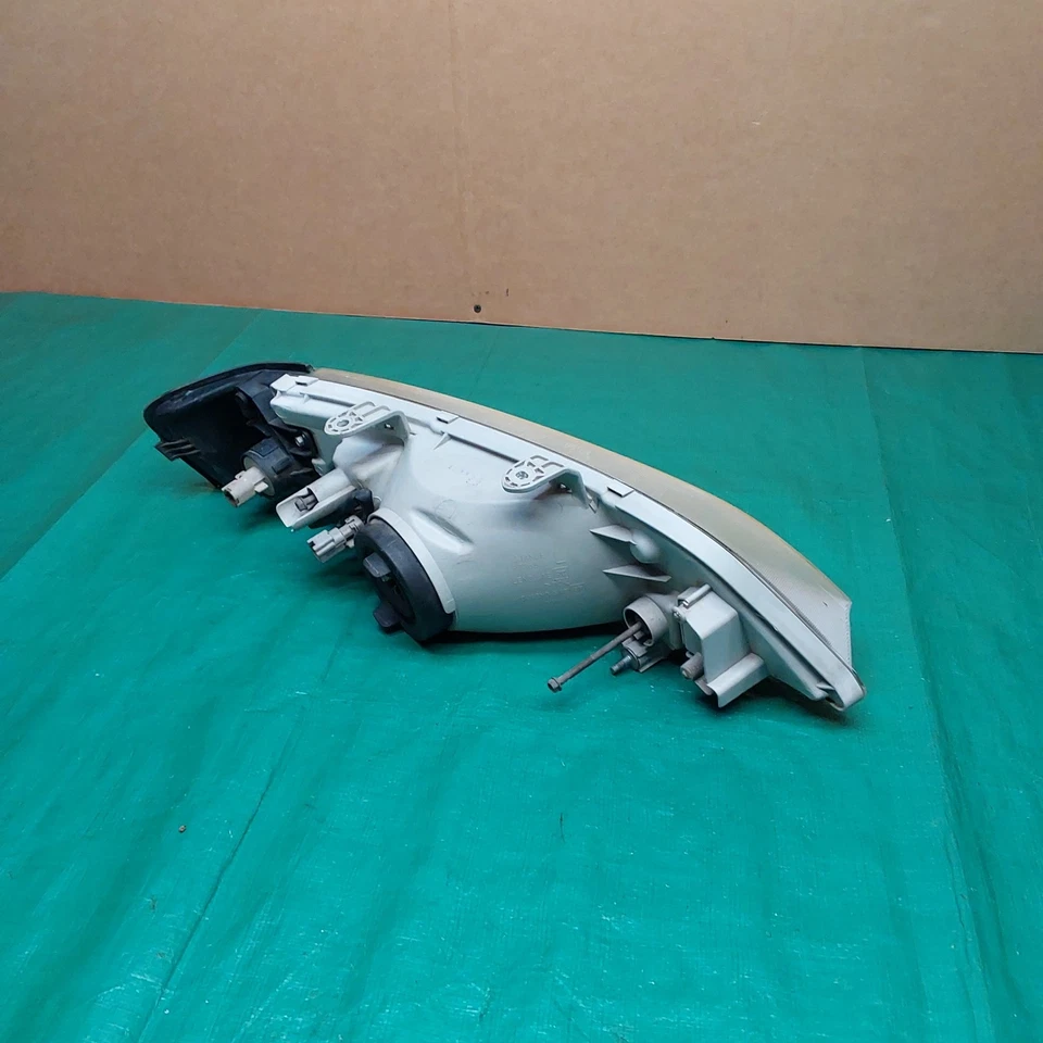 Faro halógeno lateral izquierdo Infiniti G20 1999-2002 OEM 26065-7J100 Foto 3 de 4
