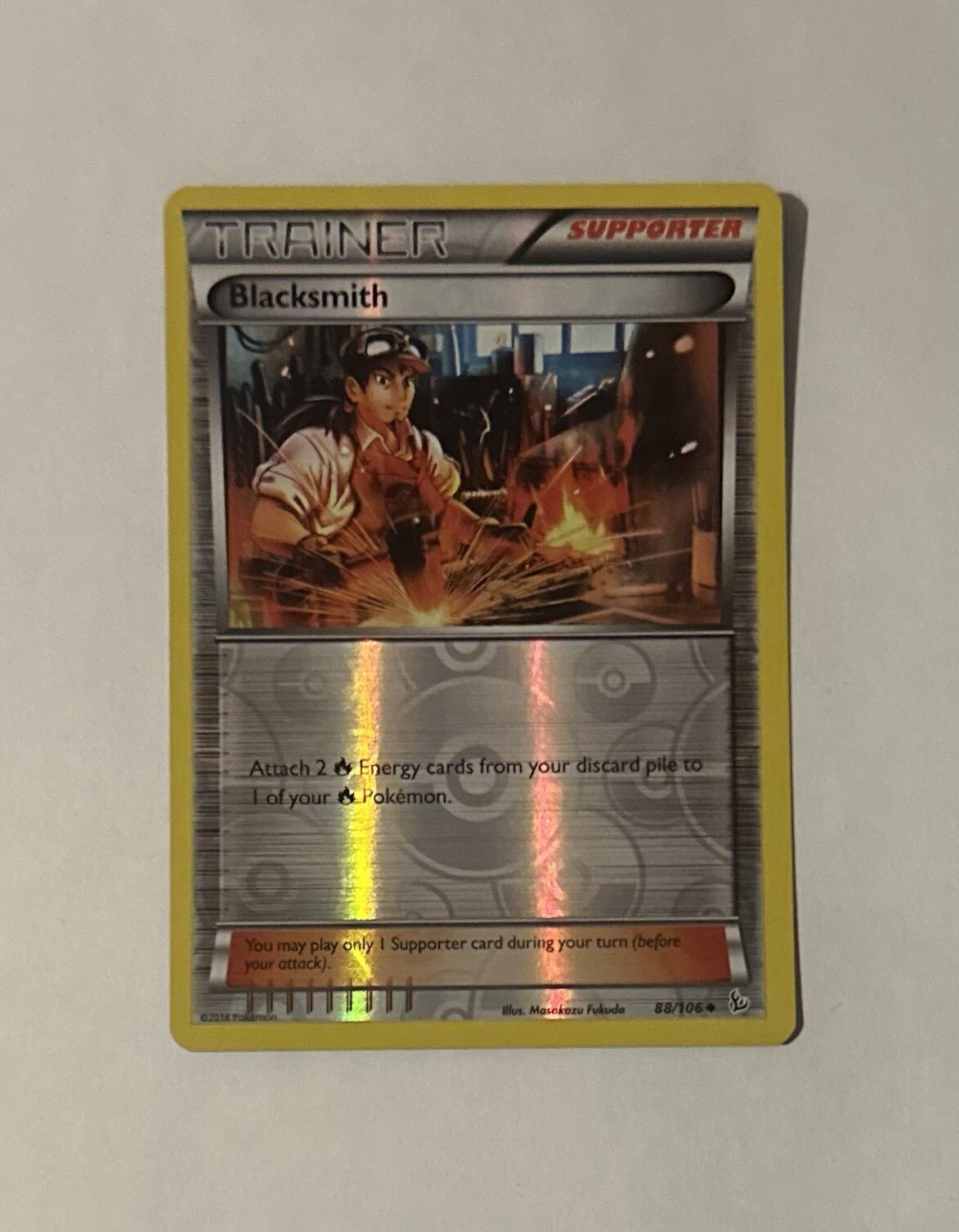 Blacksmith Reverse Holo Uncommon 88/106 Flashfire Pokemon NM