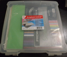 HUGE NEW LOT of 12x12 assorted scrapbooking paper  clear plastic storage case