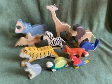 Holztiger Sammlung 11 tlg. – Holztiere (Löwe, Giraffe, Tiger, Flusspferd uvm.)