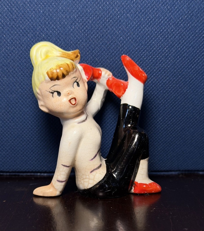 Mid-century ceramic teen girl-on-the-phone figurine from Japan — peak 1950s bopper nostalgia in glazed ceramic form.