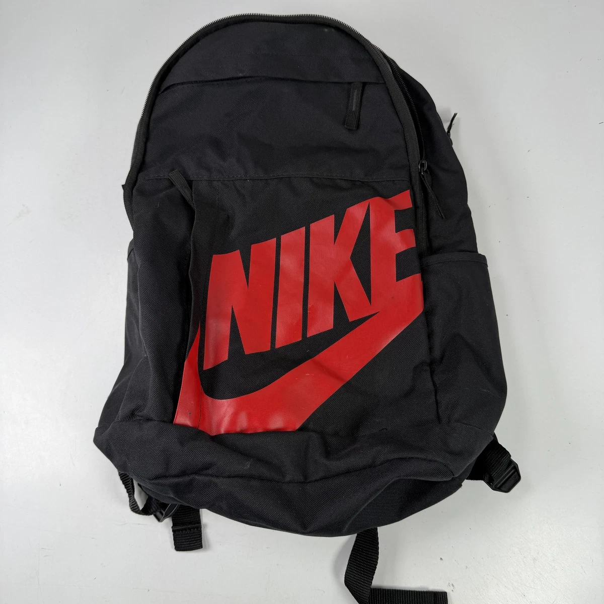 nike backpacks south africa Elemental Backpack Black – Tekkie Town handling-time_2-3d A zipped pocket on Color:Confetti/Saddle Brown Nike Michigan Vapor Backpack