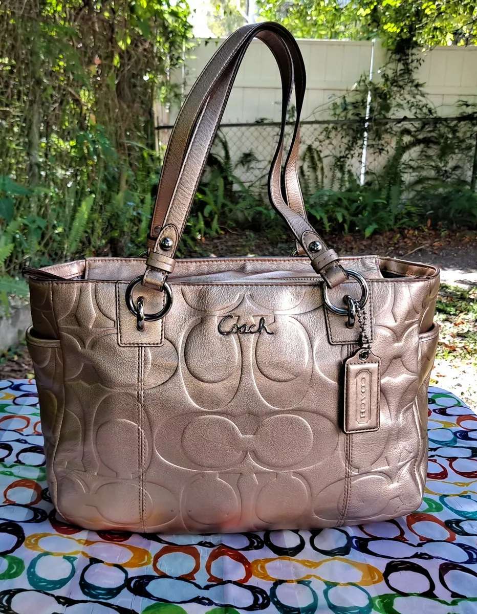 Coach signature store embossed leather
