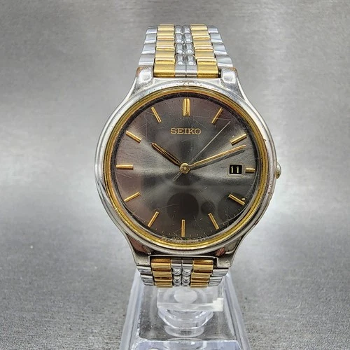 Seiko Watch Men 33mm Silver Dial Two Tone Round Date V732-0269 New Battery