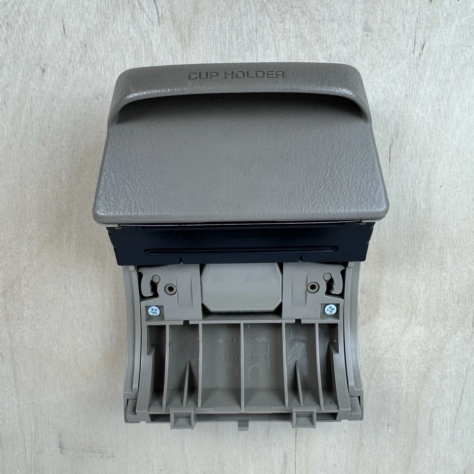 Portavasos consola trasera Toyota Corolla 1998-2002 marrón OEM 55630-02010 Foto 3 de 4