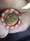 WHEAT PENNY ROLL WITH A UNKNOWN BU WHEAT PENNY SHOWING