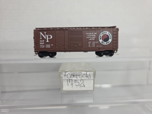 Vagón de carga Con Cor 1752 escala N Northern Pacific 40' NP 9143 con micro trenes camiones | Zustand: Used