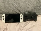 Nintendo Switch OLED Model White Handheld Console 64GB with Pro Controller
