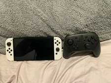 Nintendo Switch OLED Model White Handheld Console 64GB with Pro Controller