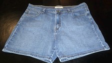 Levi's 515 vintage denim shorts, featuring a classic medium-to-dark wash and the
