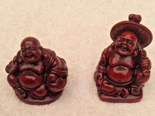Buddha Figurines Red Resin Buddhas. 