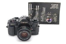 ALL Works Canon A-1 Black 35mm Film Camera New FD 50mm f2 Lens Near MINT JAPAN