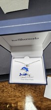 0777. Silver Tone Dolphin And Baby Necklace