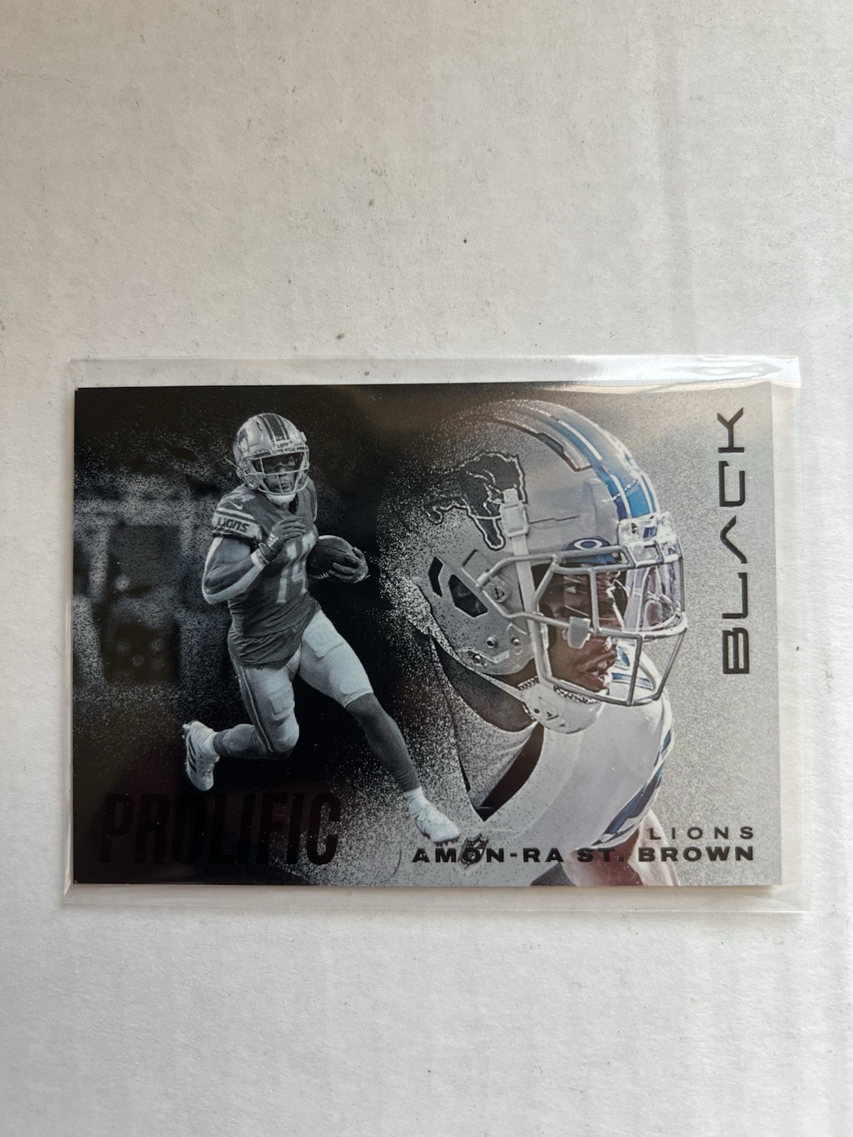 2023 Panini Black Rookies Amon-Ra St. Brown Prolific #PC-11