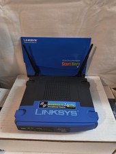 2C Linksys (WRT54GS V5) 54 Mbps 4-Port 2.4 GHz Wireless G Broadband Router