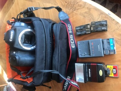 Canon EOS 50D DSLR Camera Body + 3 batteries charger CFcard flash case strap