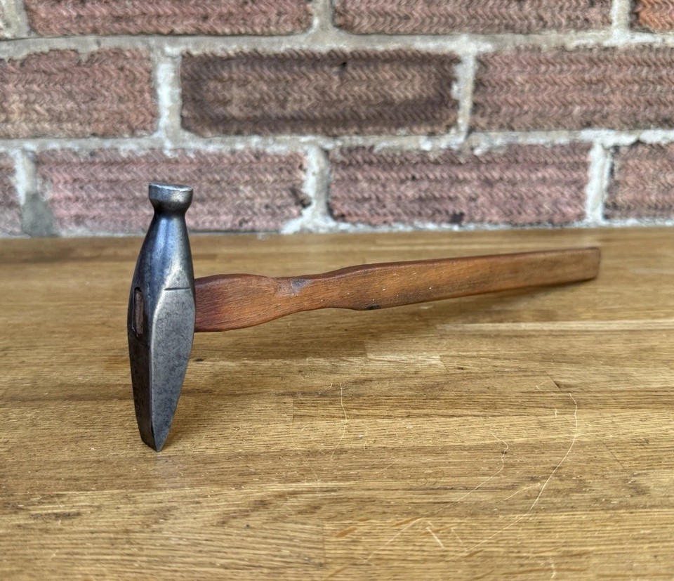 A beautifully crafted cross pein jeweller's hammer with the kind of hand-forged character that modern tools completely lack.
