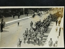 0492. WW1 RP. Military Band Marching in Street. Unidentified Regiment