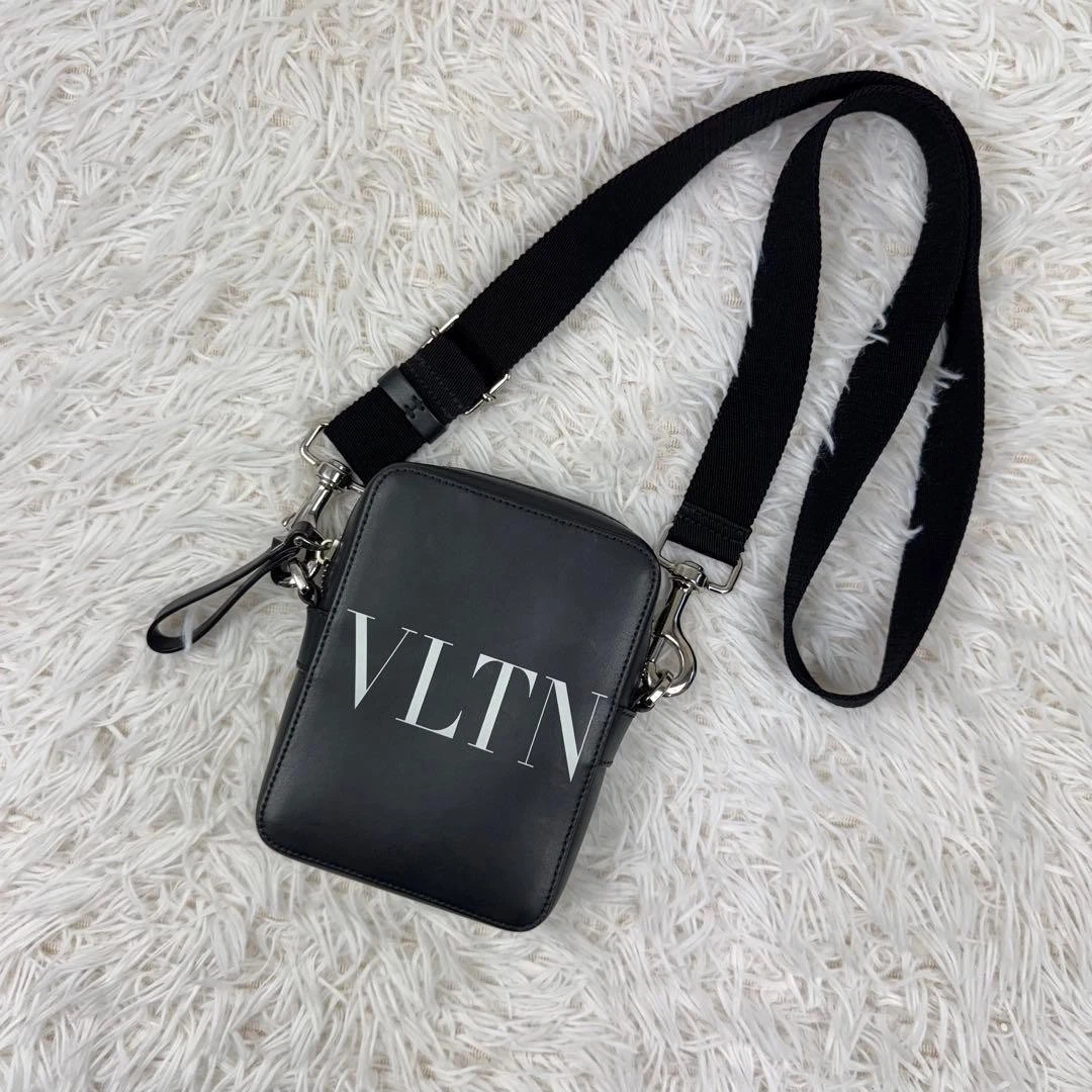 Valentino — VALENTINO Garavani VLTN Logo Mini Crossbody Bag Black Leather Silver Unisex