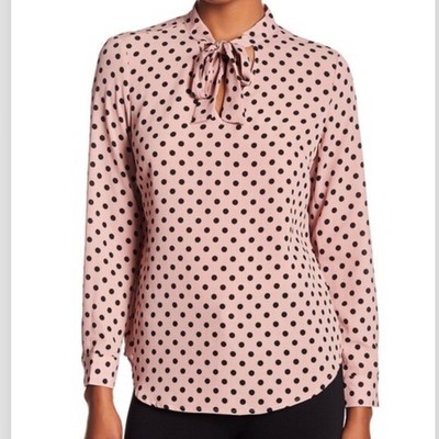 pink and black polka dot blouse