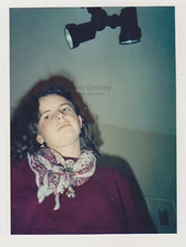 Beautiful Young Woman with a Lovely Face in the Spotlight Unusual Snapshot Photo