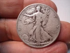 WALKING LIBERTY SILVER  50  CENTS   1938 P  #7