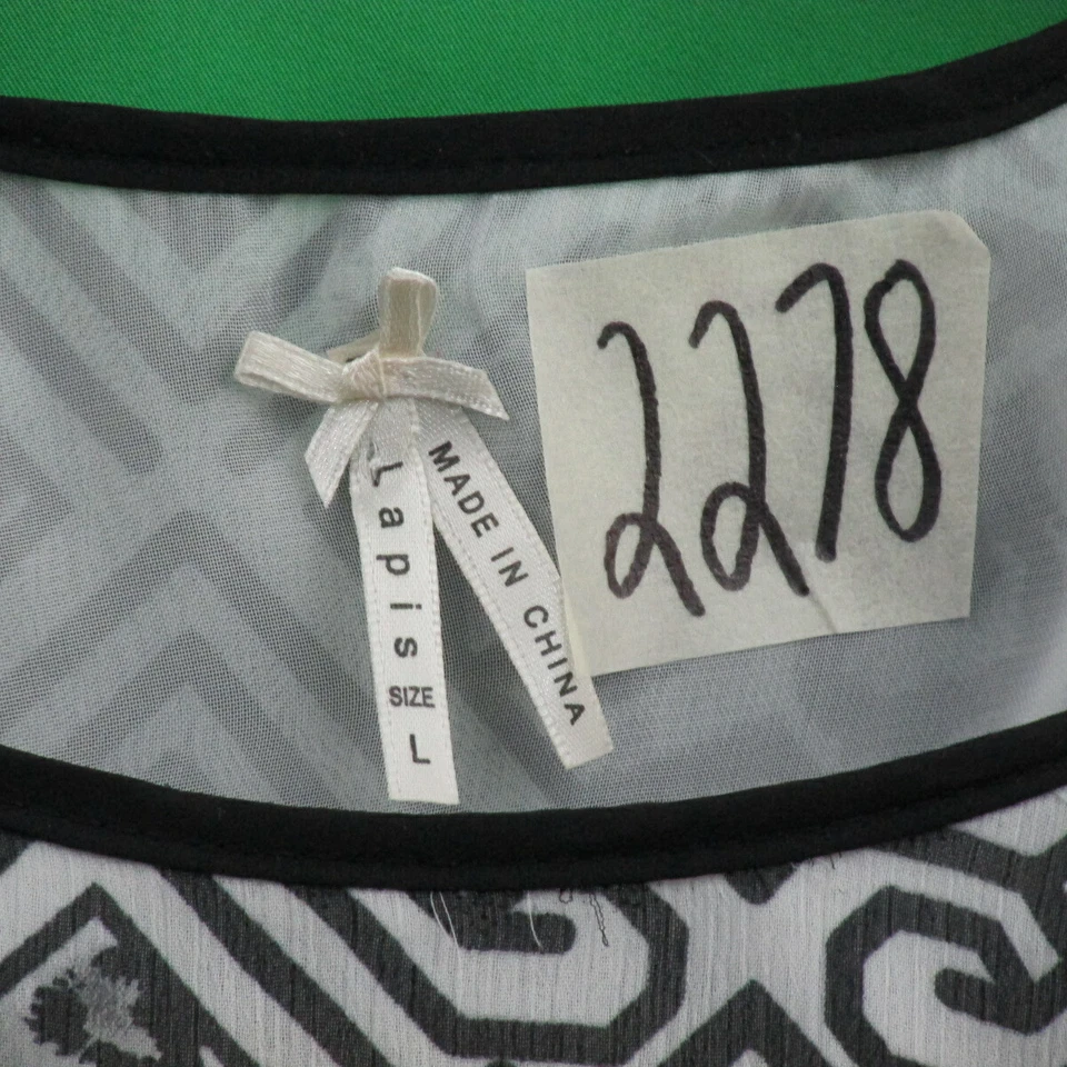 Top Lapislázuli Mujer, Tirantes Espagueti, Talla L, Estampado Blanco y Negro con Volantes  Foto 2 de 4