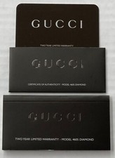 Gucci watch original 2 year limited warranty card and book Model 4605 Diamond