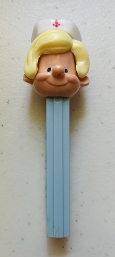 Vintage BLONDE NURSE - PEZ Dispenser - No Feet US Pat 3.8 Light Blue Base (USA)