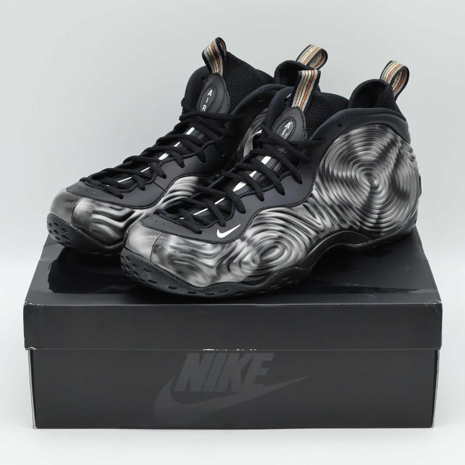 DJ7952-002 COMME des GARÇONS HOMME PLUS Nike Air Foamposite One Olympic (Men's)