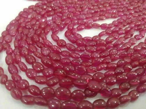 Perline sfuse di gemma rossa