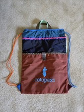 Cotopaxi Tago Multicolor Four Pocket Drawstring Backpack