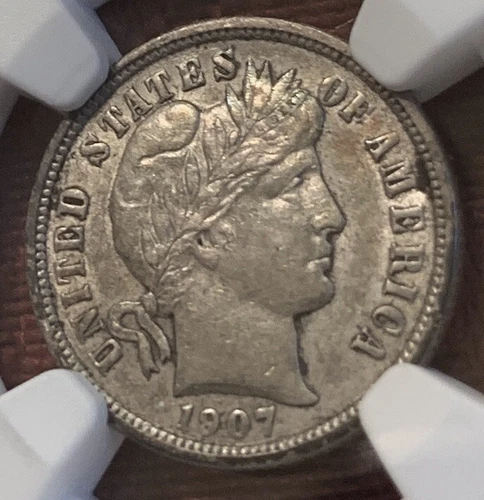 1907 O BARBER DIME - NGC AU 53