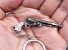 mini  gun BIOHAZHARD 8 village weapon Pistol M1851 metal  keychain toy gift  5cm