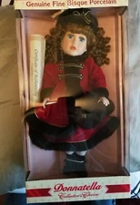 DONATELLA COLLECTORS CHOICE  bisque porcelain doll in original box 