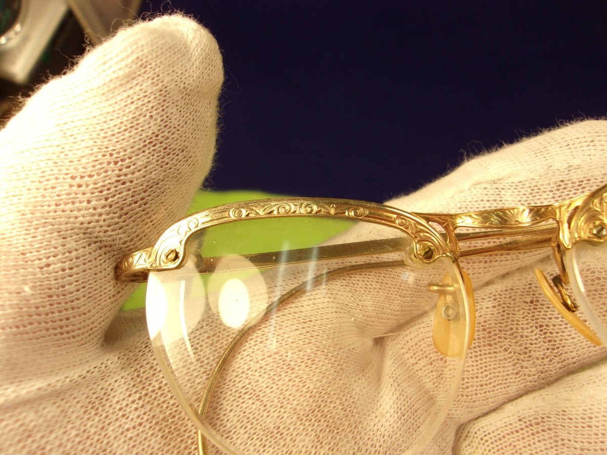 Source Unknown Gold Rhinestone Cat-Eye Glasses with Black Temples Woman with Cat Eye Glasses. In the 1950s Cat Eye glasses  main image 3