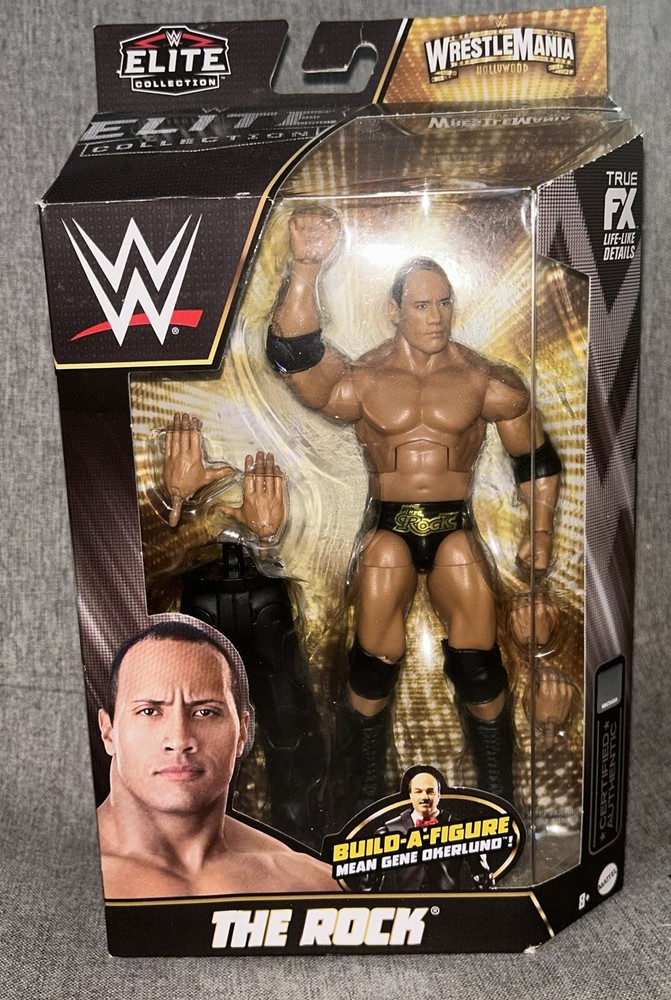 WWE Elite Collection The Rock with Build-a-Figure Mean Gene Okerlund - Brand new