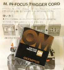   MINT  OLYMPUS In-focus Trigger Cord for OM-30 or OM-F Camera in Box manual