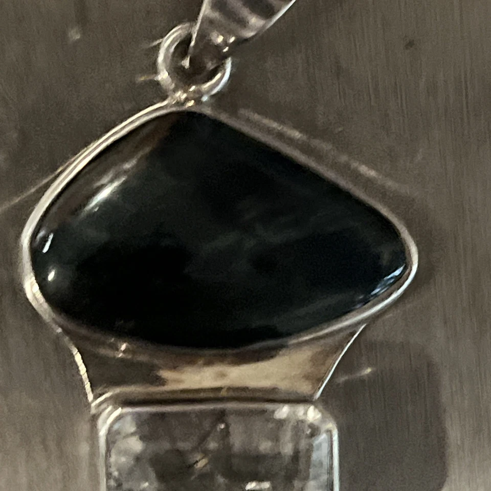 Colgante de plata de ley de cuarzo rutilado, topacio azul y piedra negra de colección Foto 3 de 4