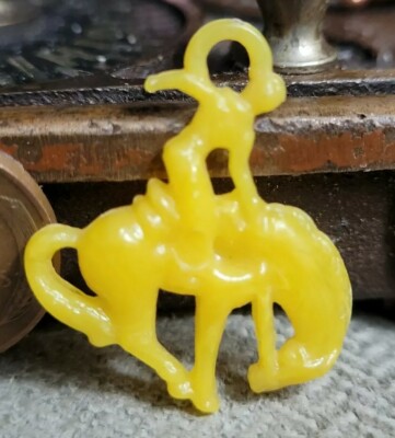 Vintage plastic yellow COWBOY BUCKING BRONCO HORSE gumball charm prize jewelry 