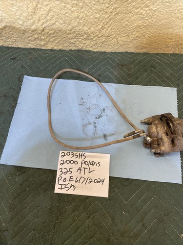 2000 Polaris Trail boss 325 rear brake caliper with hose line 203