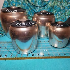 Vintage, MCM, Kromex Rose Gold Aluminum Canister set with Bakelite lids,set of 4