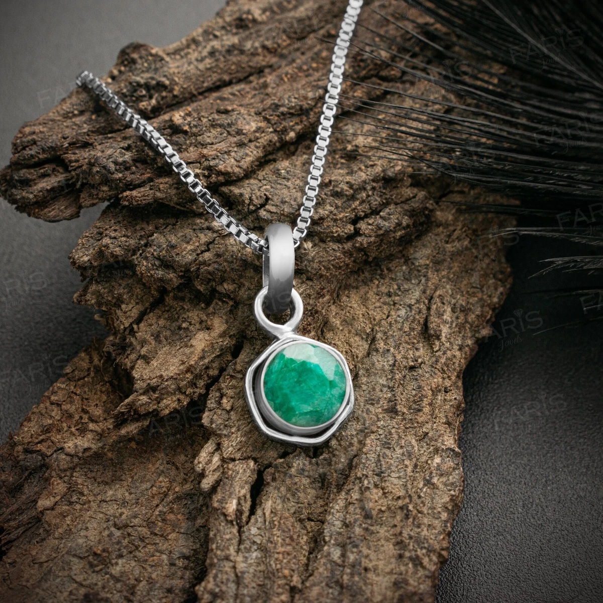 Sterling silver hotsell emerald pendant