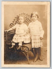 Antique Vintage RPPC Real Photo Postcard Two Girls Plaid Dresses Wicker Chair