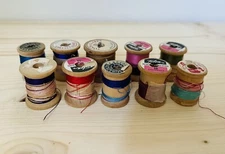 Antique 10-Piece Sewing Thread Wooden Spool Set W/Multicolored Thread Remnants